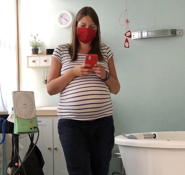 Fiona wearing a mask in the birth centre